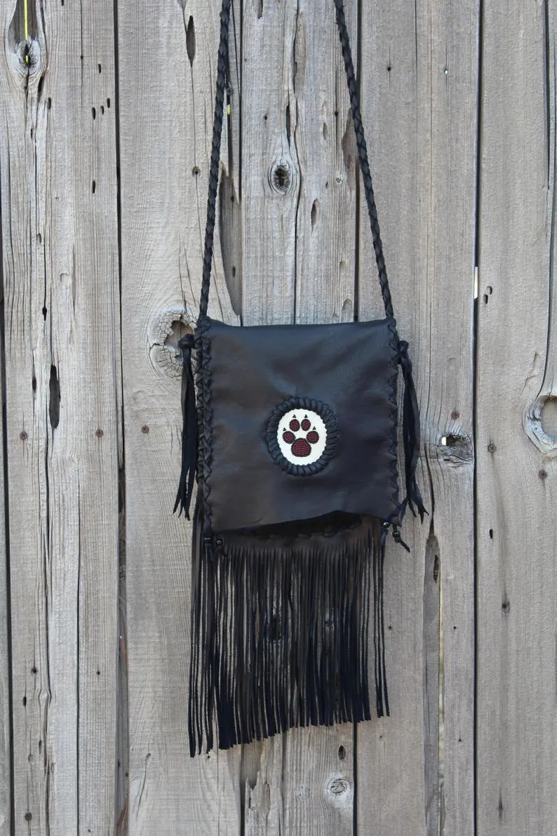 Stylish Black Fringed Handbag with Elegant Beaded Wolf Paw Design